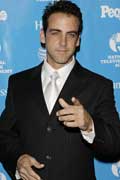 Carlos Ponce in a Suit